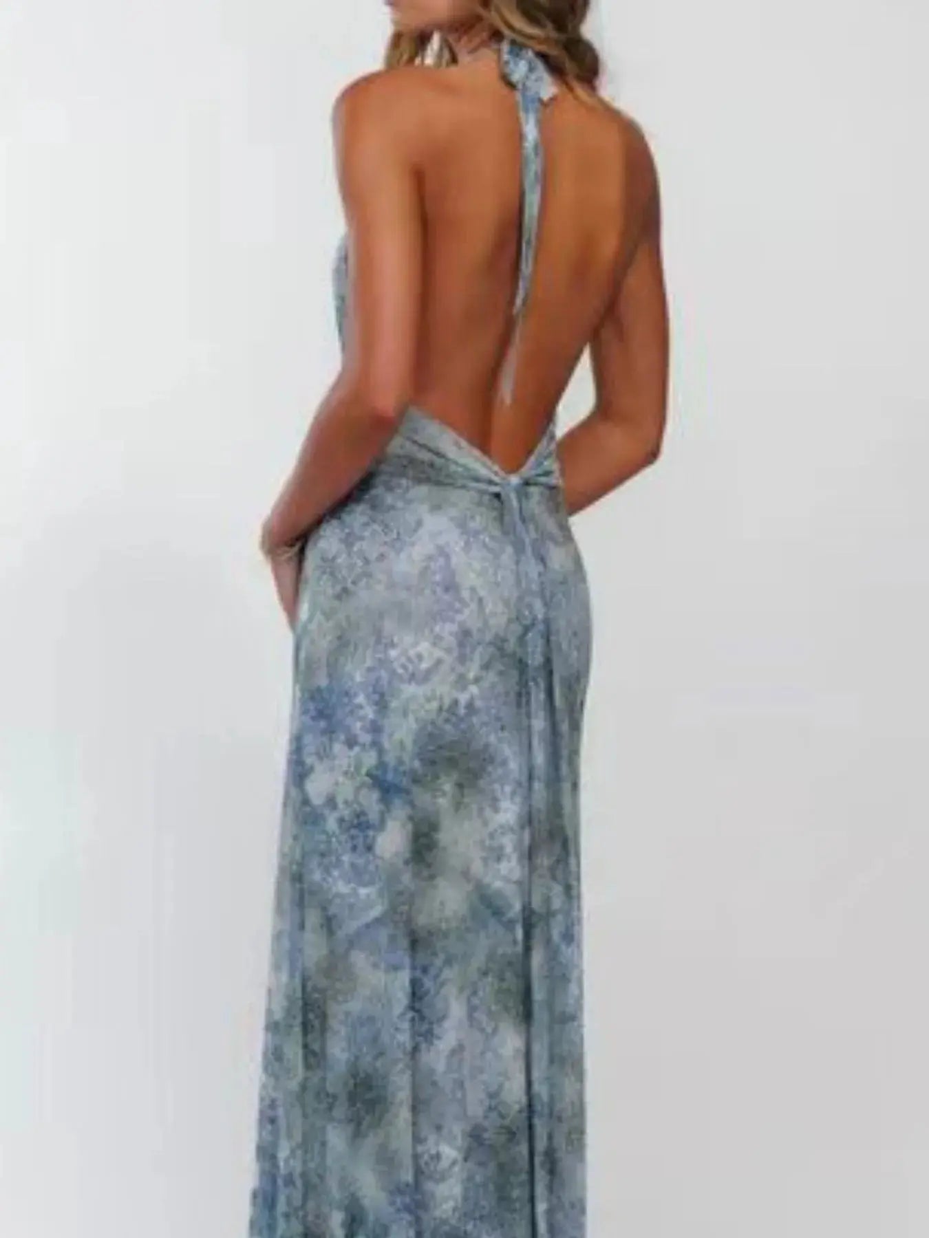 Floral Maxi Dress with Halter Neck and Deep V Design.