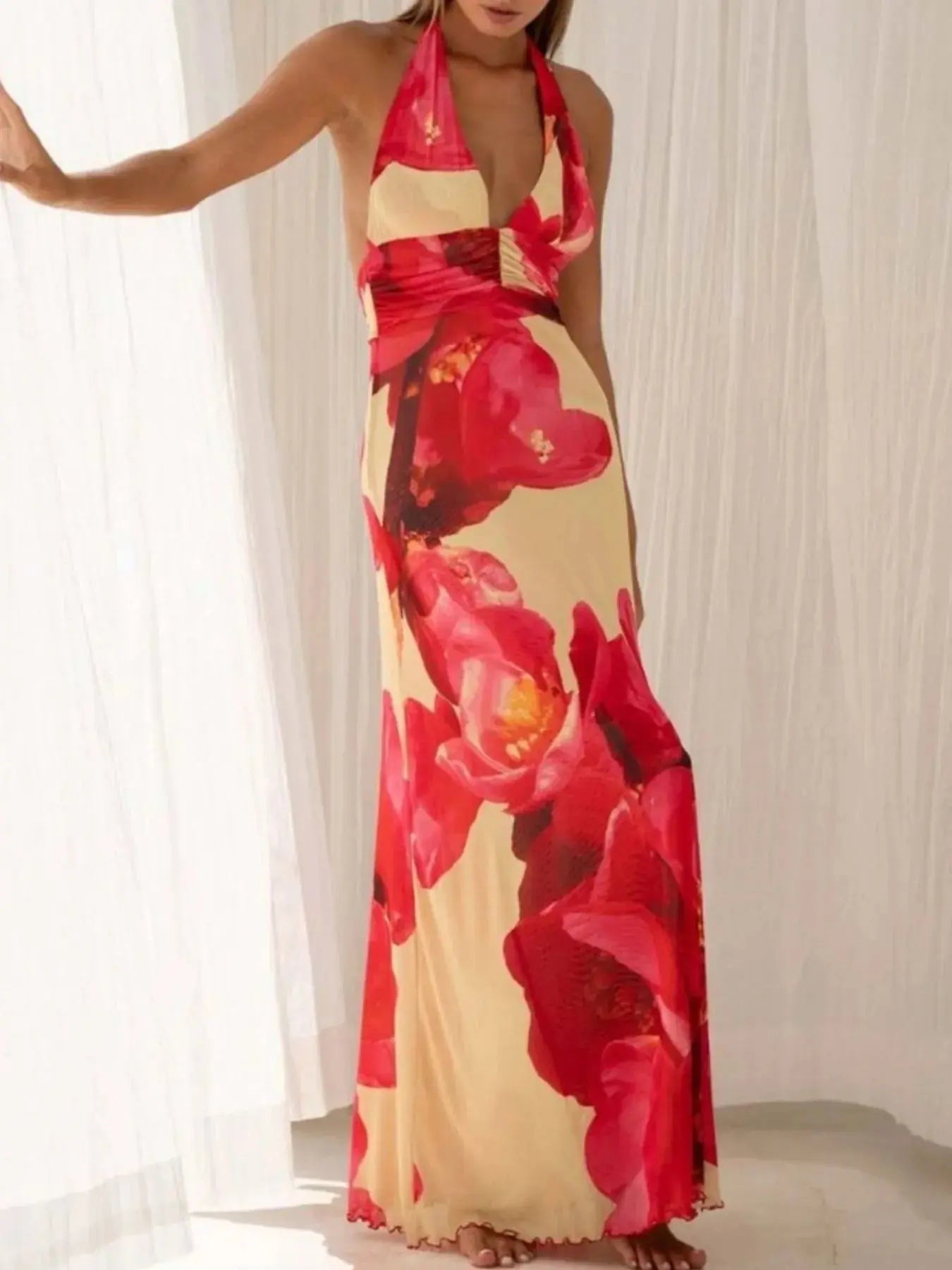 Floral Maxi Dress with Halter Neck and Deep V Design.