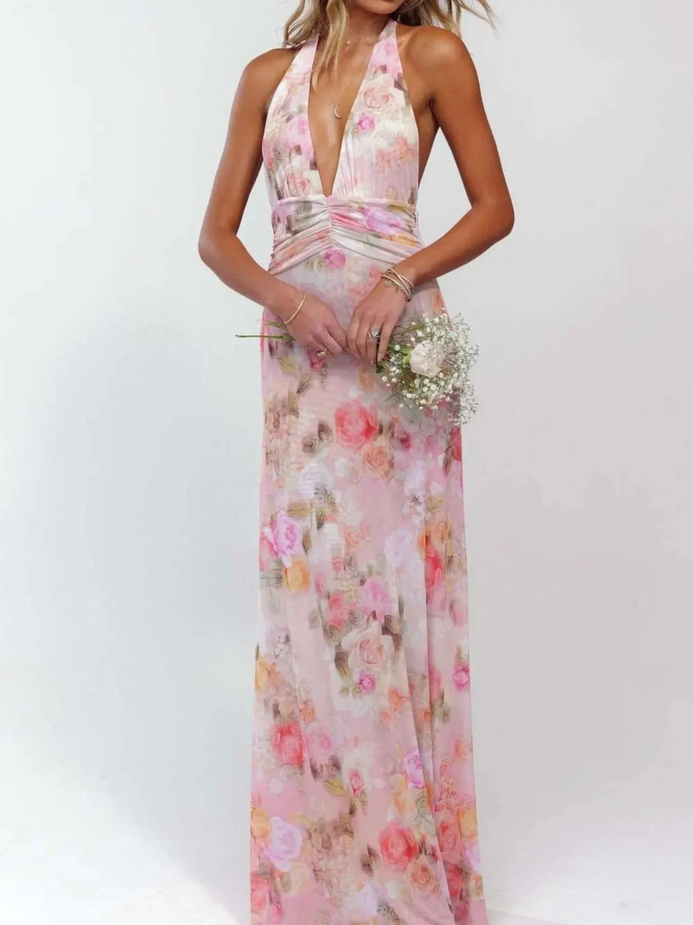 Floral Maxi Dress with Halter Neck and Deep V Design.