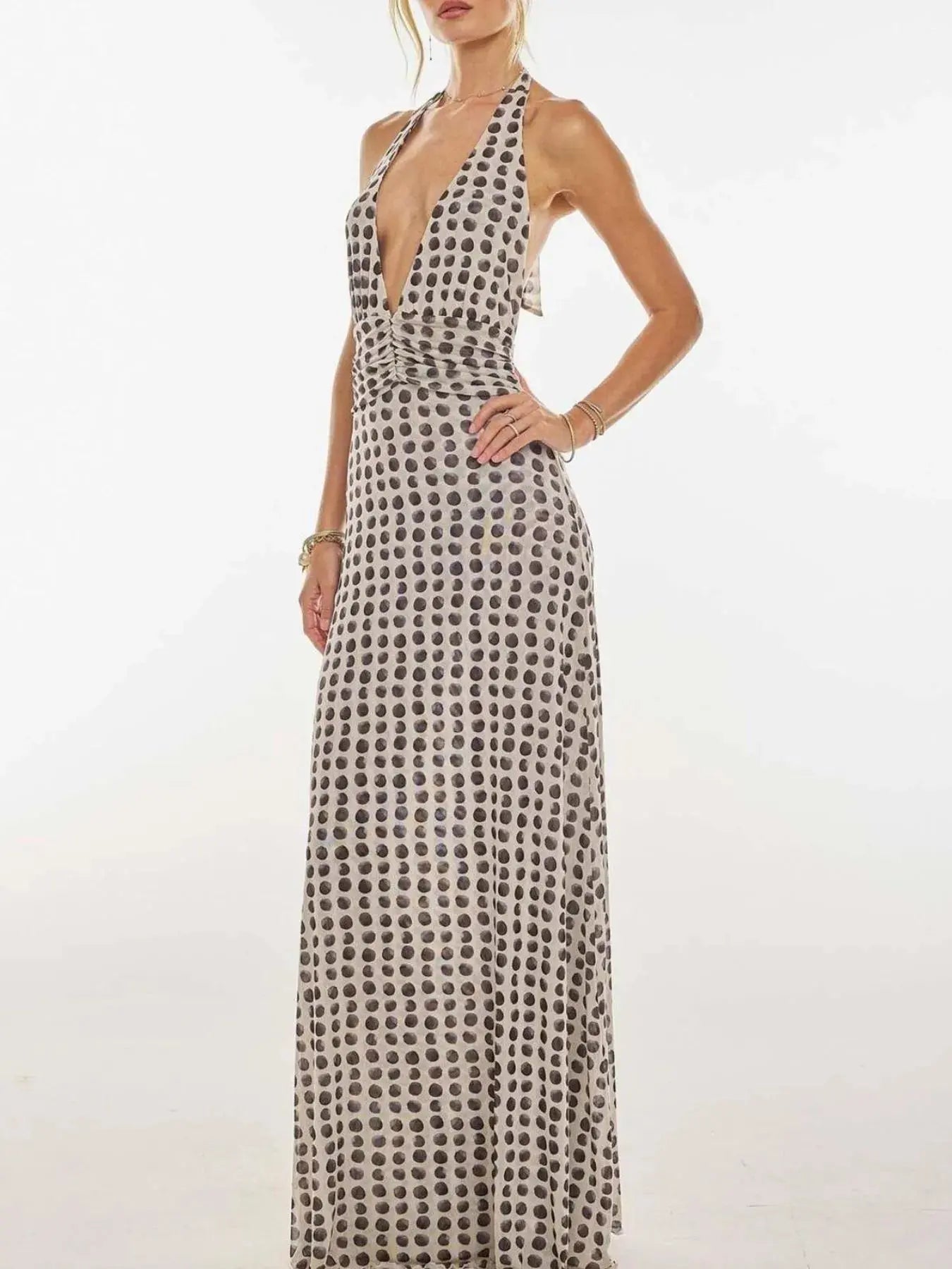 Floral Maxi Dress with Halter Neck and Deep V Design.